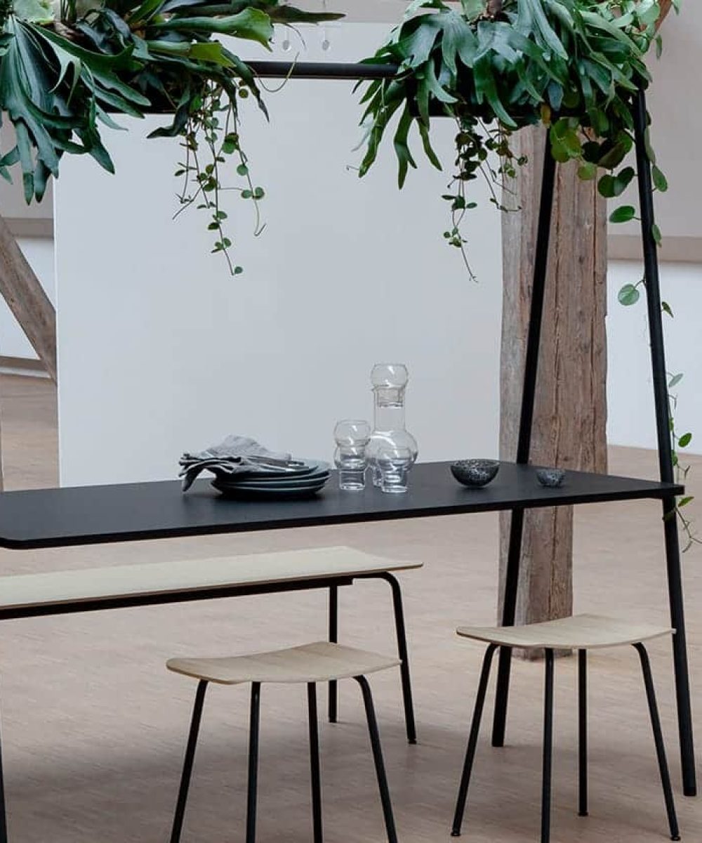 Community tables with stools and chairs in an office with office stools