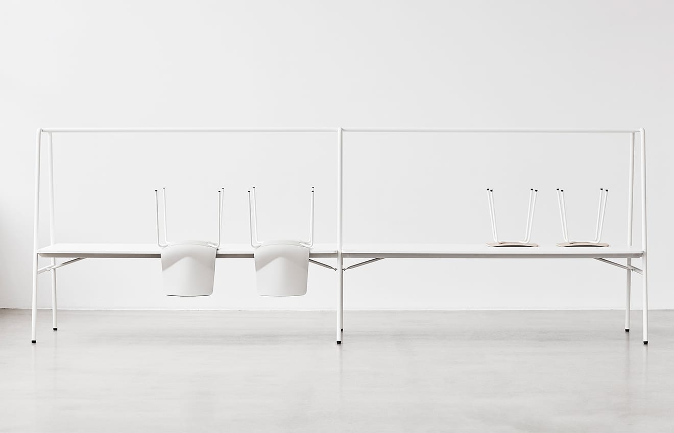White community tables and chairs in a room