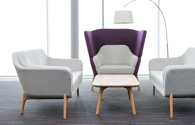 Three office sofas with an office coffee table