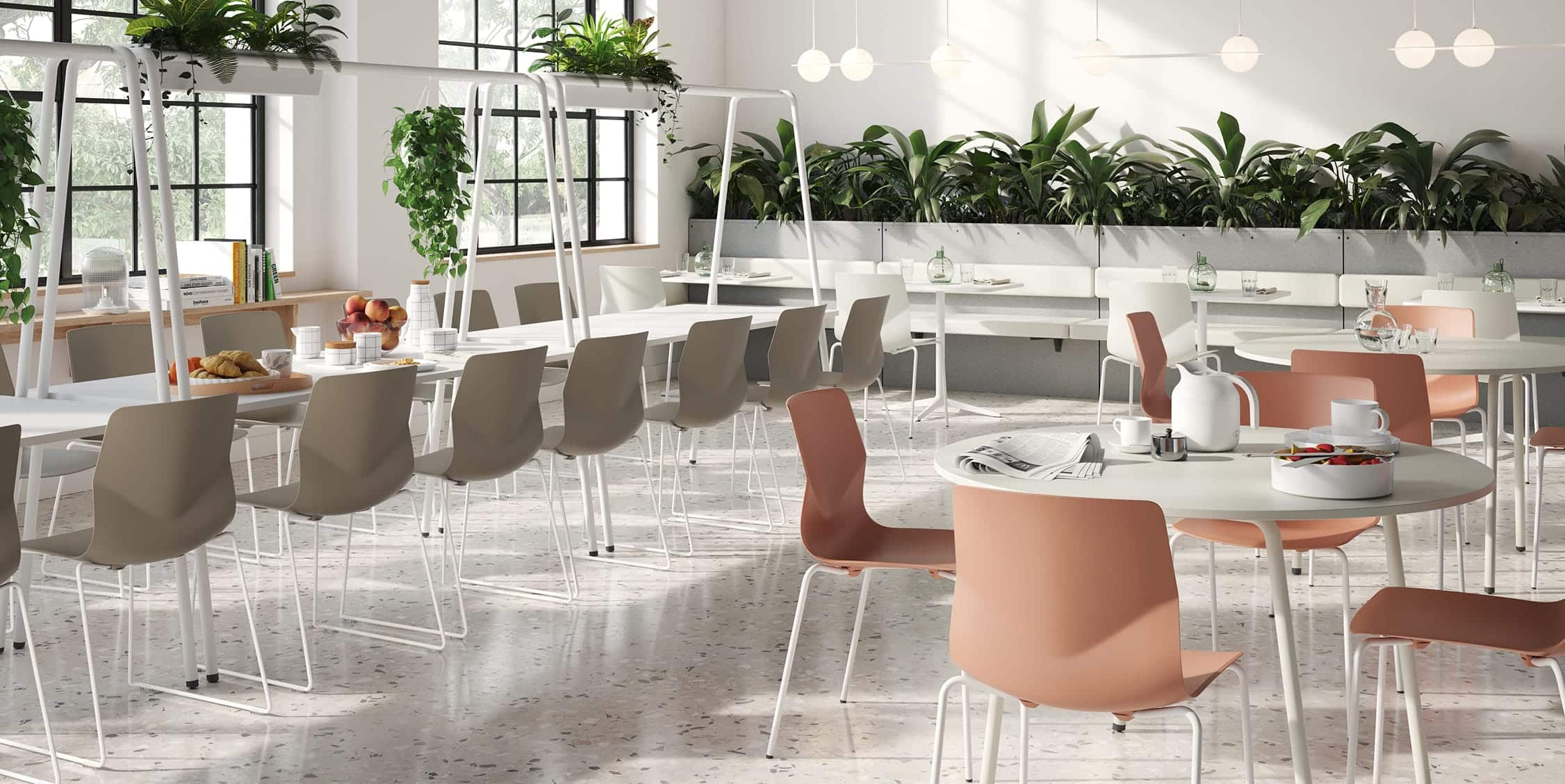 An image of a canteen with canteen furniture, tables and chairs.