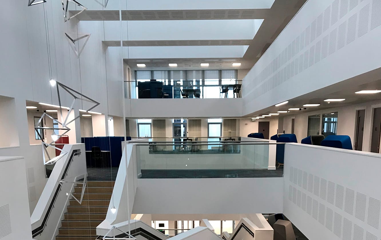 The atrium of a modern office building.