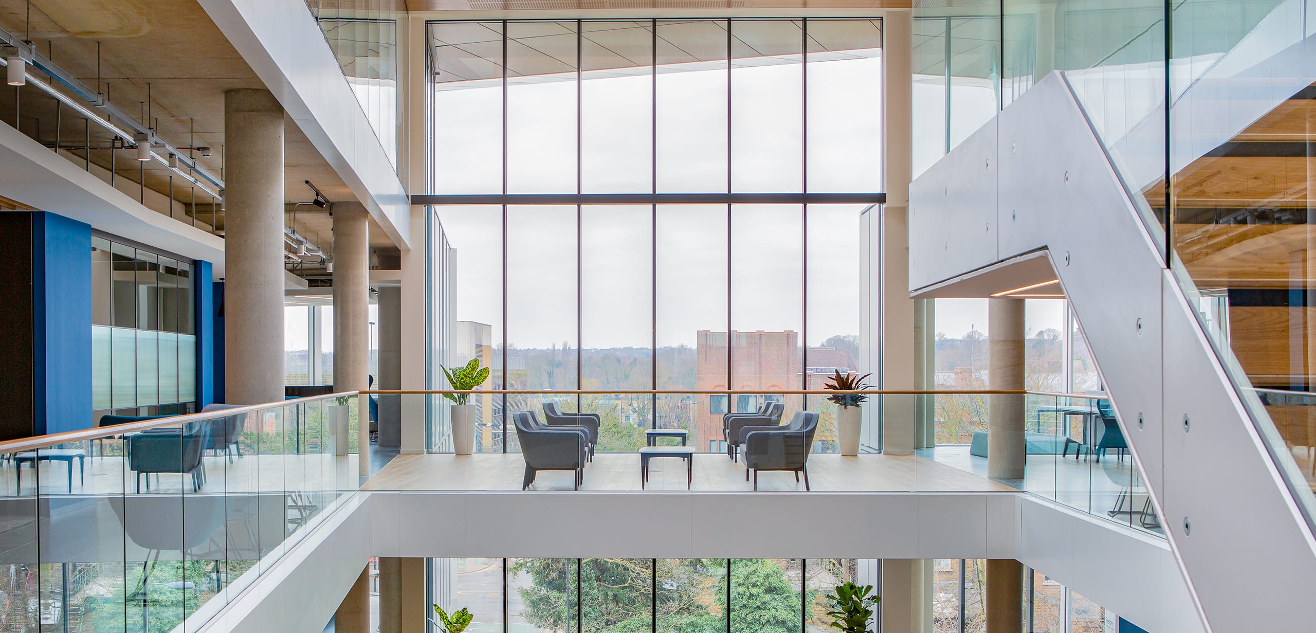 A glass atrium in a modern office building.