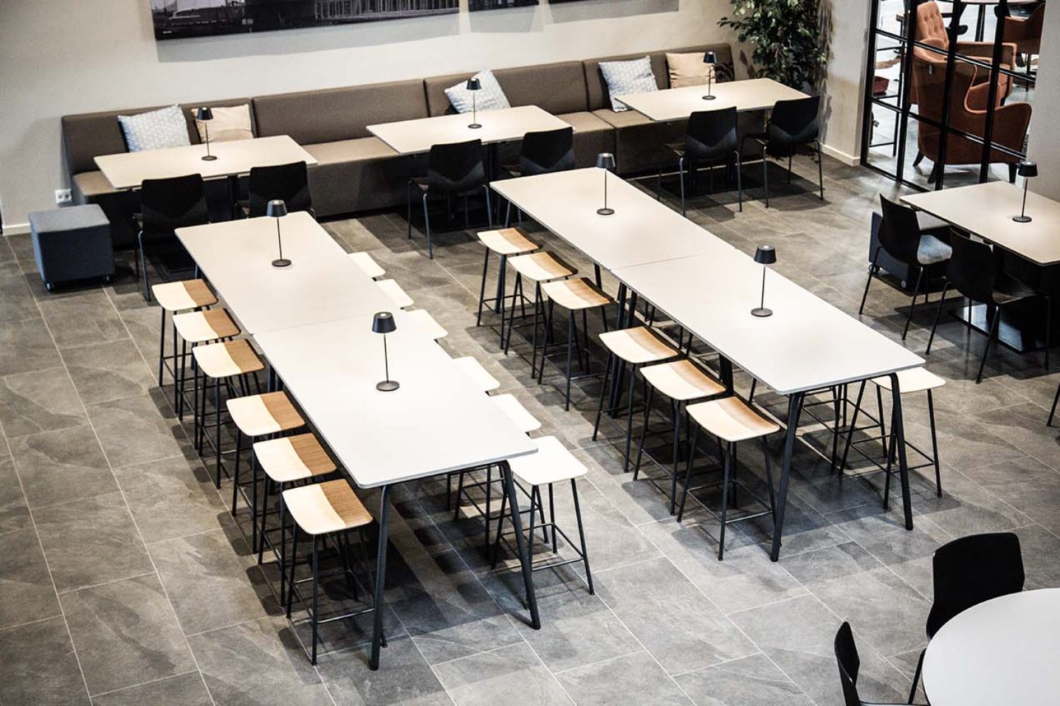 Canteen furniture in a canteen with tables and chairs.