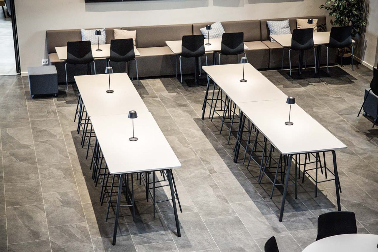 Canteen furniture in a canteen with tables and chairs.