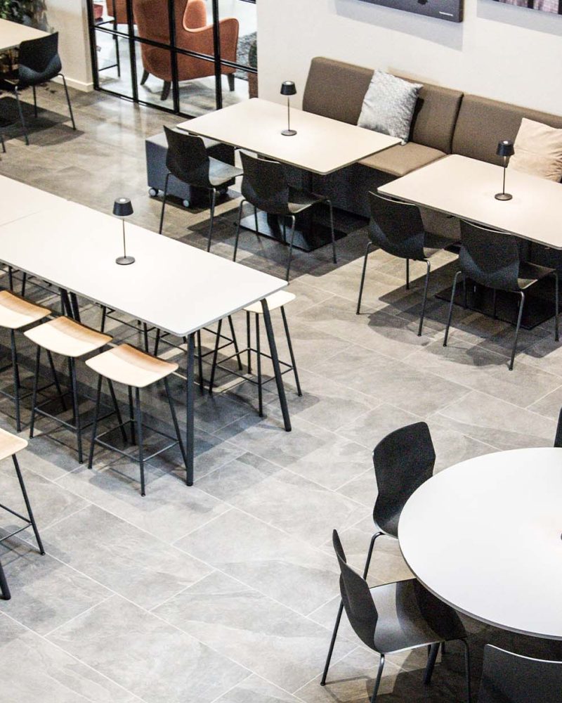 Canteen furniture in a canteen with tables and chairs.