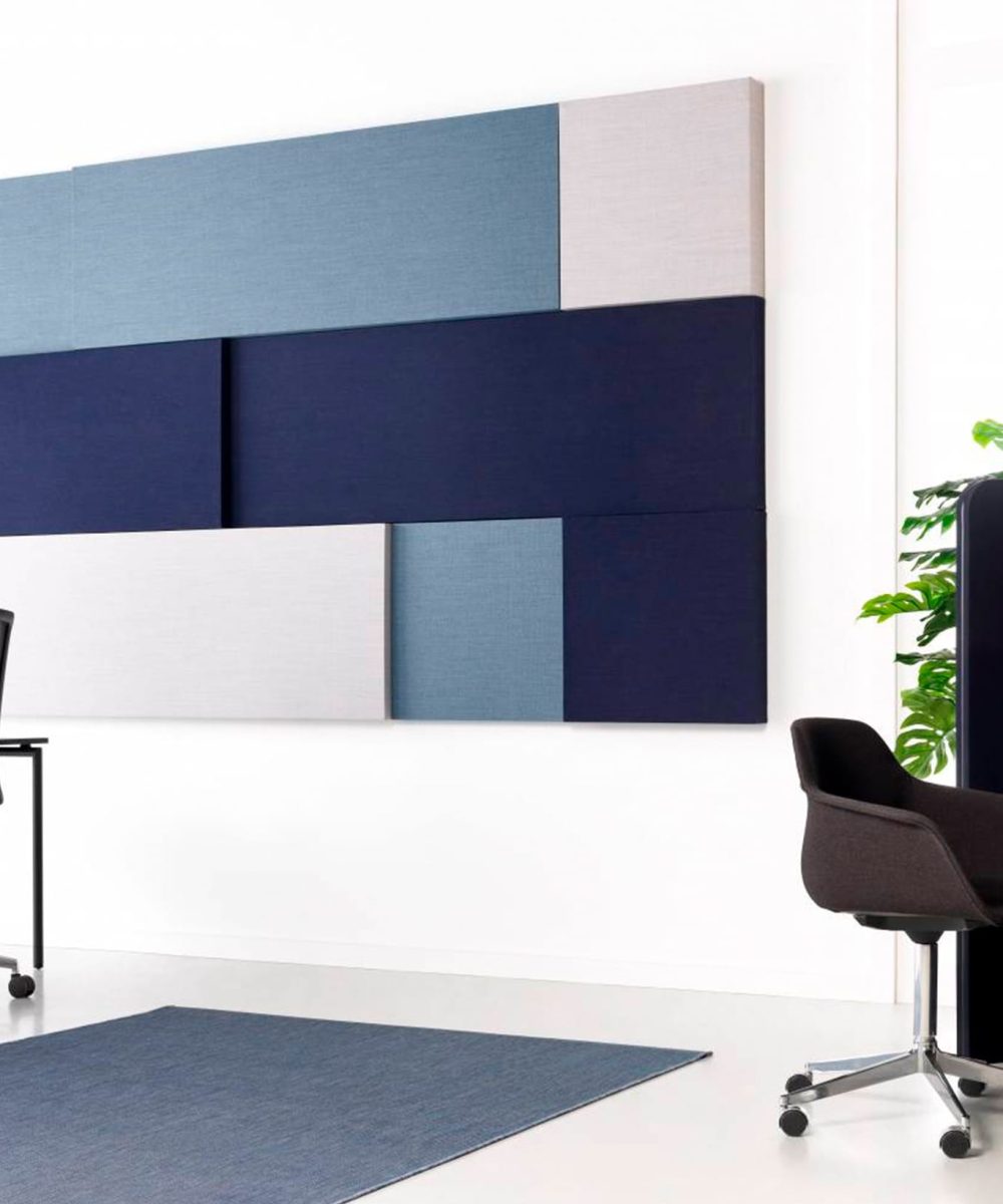 Acoustic panels for offices on a wall in an office.
